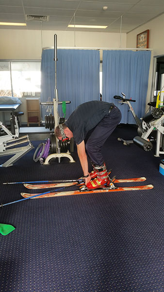 Low-back-stretch to avoid skiing injuries